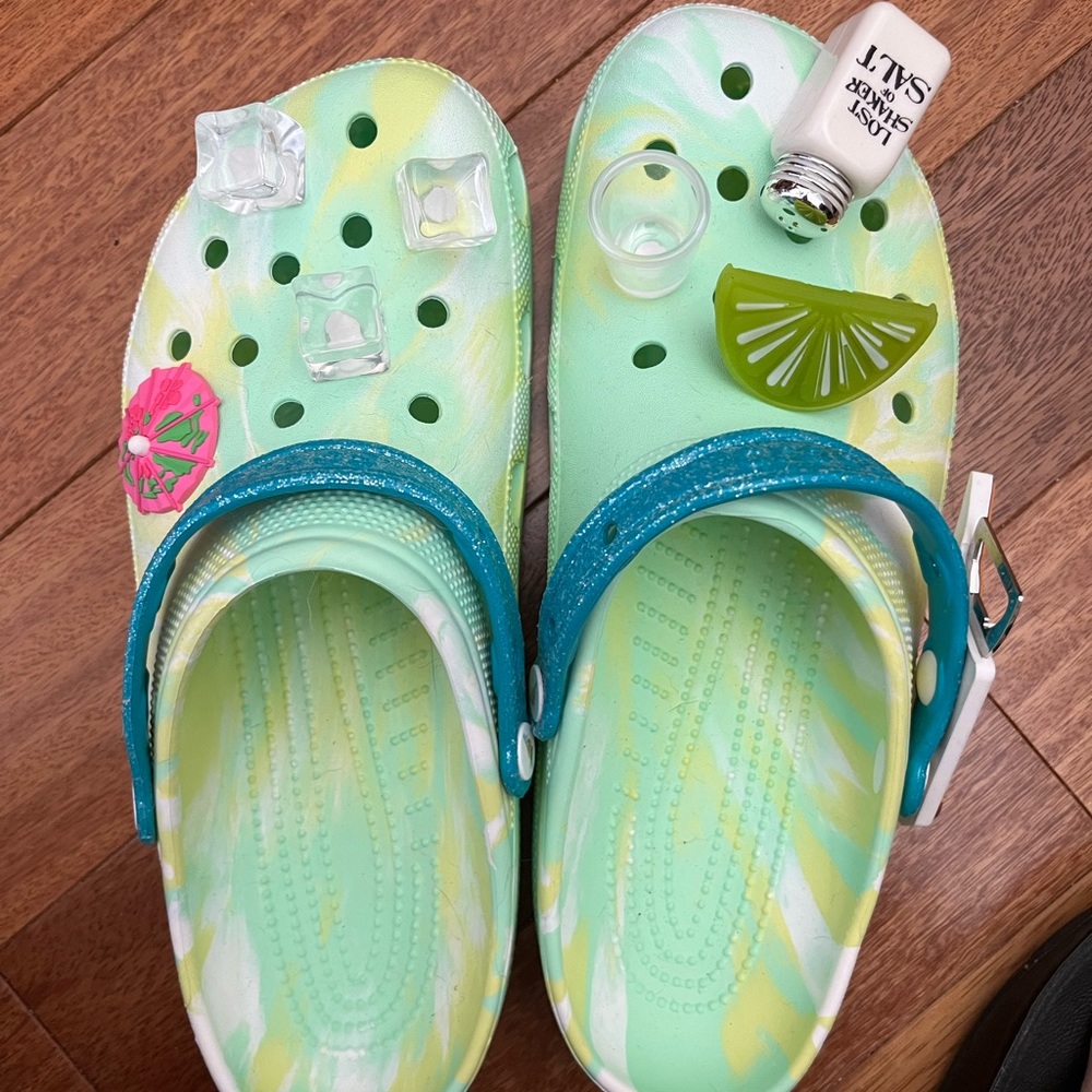 Margaritaville Crocs, men’s size 12. Husband tried them on but never wore them.